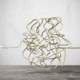 A businessman pulling a tangled rope, symbolizing the complexity of data security in New York, cybersecurity challenges, and compliance regulations.